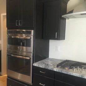 Kitchen with black cabinets